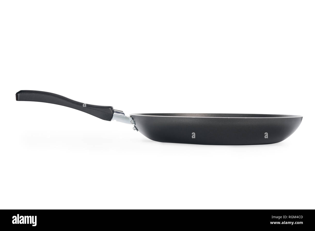 Black frying pan side view. Isolated on white, clipping path included