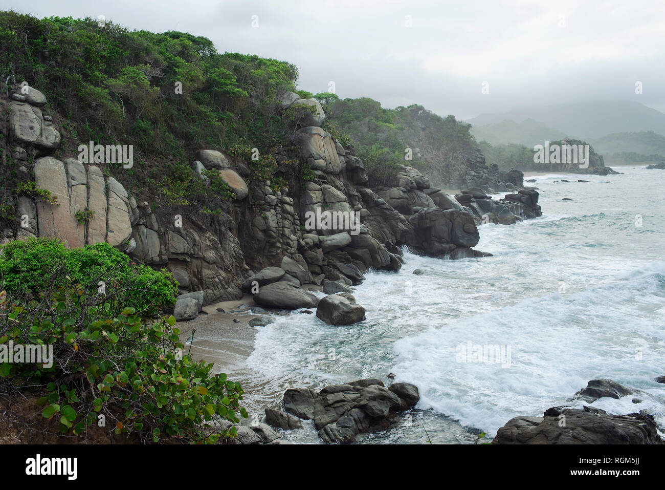 The rocky shore of Tayrona Park National Park shot from Castilletes viewpoint. Colombia. Sep 2018 Stock Photo