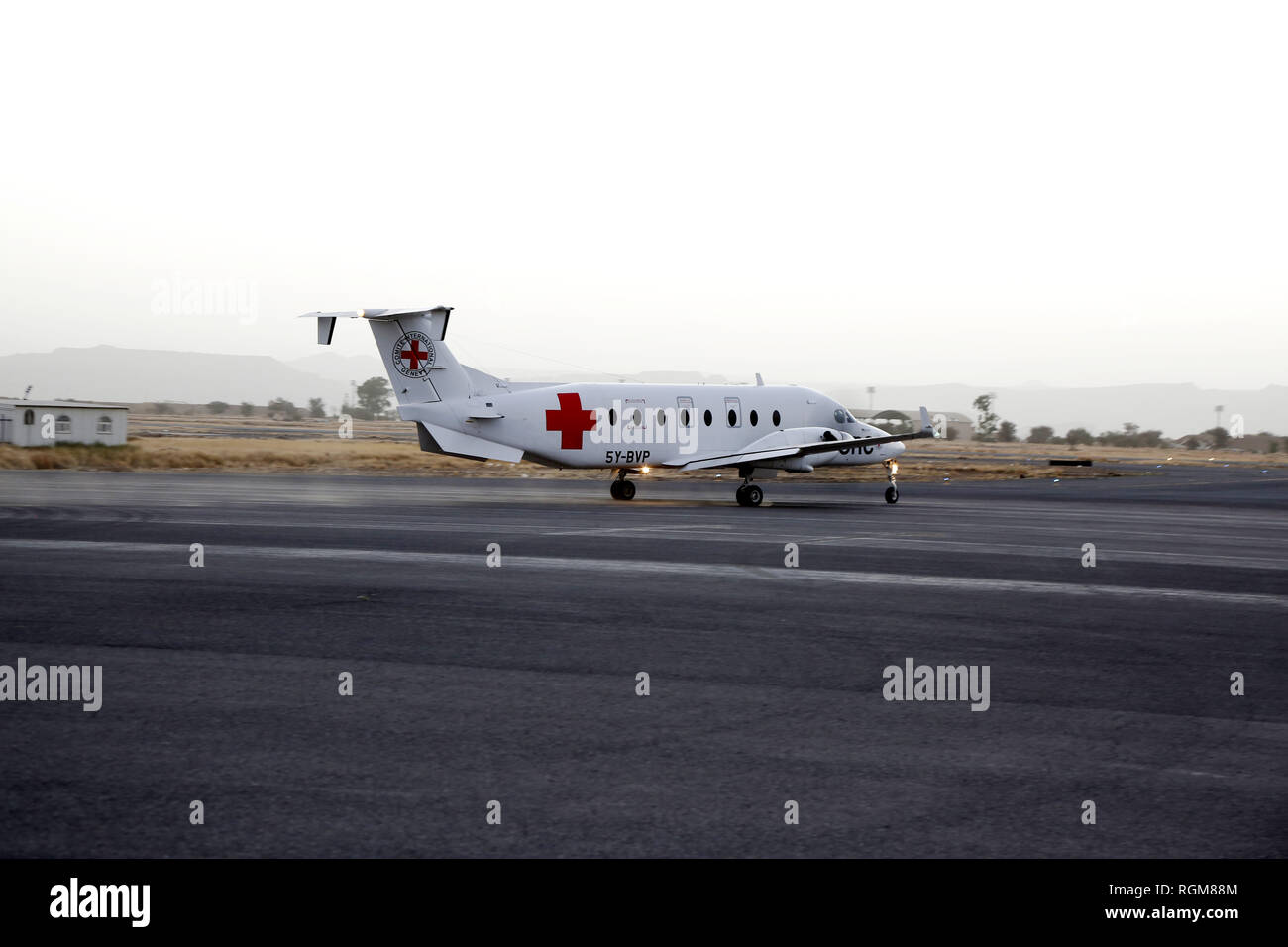 Sanaa, Yemen. 29th Jan, 2019. A plane of the International Committee of the Red Cross (ICRC) takes off as it carries Musa Awagi released by the Houthi rebels at the Sanaa International Airport, in Sanaa, Yemen, on Jan. 29, 2019. Yemen's Houthi rebels on Tuesday handed over a captured Saudi soldier to the ICRC, the rebels said in a statement. "The sick Saudi soldier Musa Awagi will be transported to his country through an ICRC plane today (Tuesday)," the statement said. Credit: Mohammed Mohammed/Xinhua/Alamy Live News Stock Photo