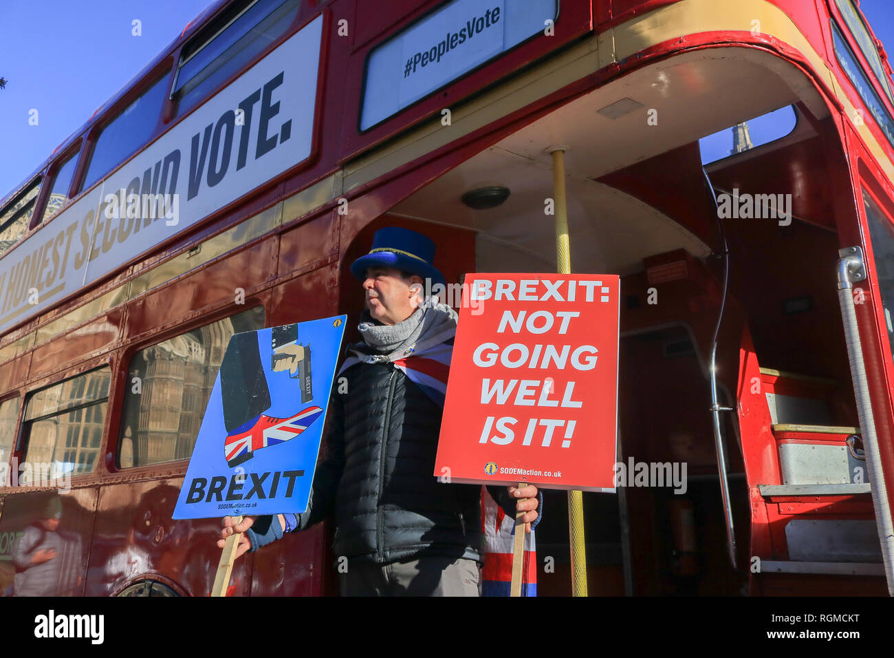 London, UK. 30th Jan, 2019. Steve Bray founder of SODEM (Stand of Defiance European Movement) stands with placards on a Red Routemaster bus outside Parliament Credit: amer ghazzal/Alamy Live News Stock Photo