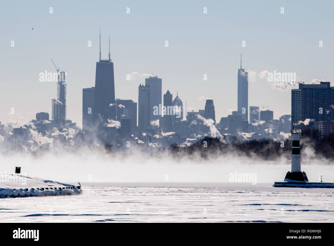 Chicago, USA. 30th Jan, 2019. The Chicago skyline is seen from Montrose Harbor in Chicago, the United States, on Jan. 30, 2019. Chicago's record for the coldest temperature was shattered on Wednesday as the polar vortex struck the biggest city in the U.S. Midwest, according to the National Weather Service (NWS). Credit: Patrick Gorski/Xinhua/Alamy Live News Stock Photo