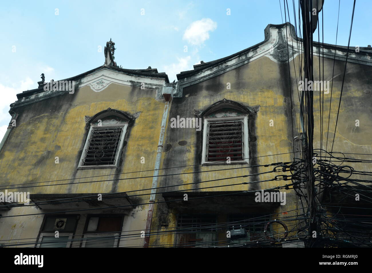 Decaying facade of an ornate structure, pasakdek Stock Photo