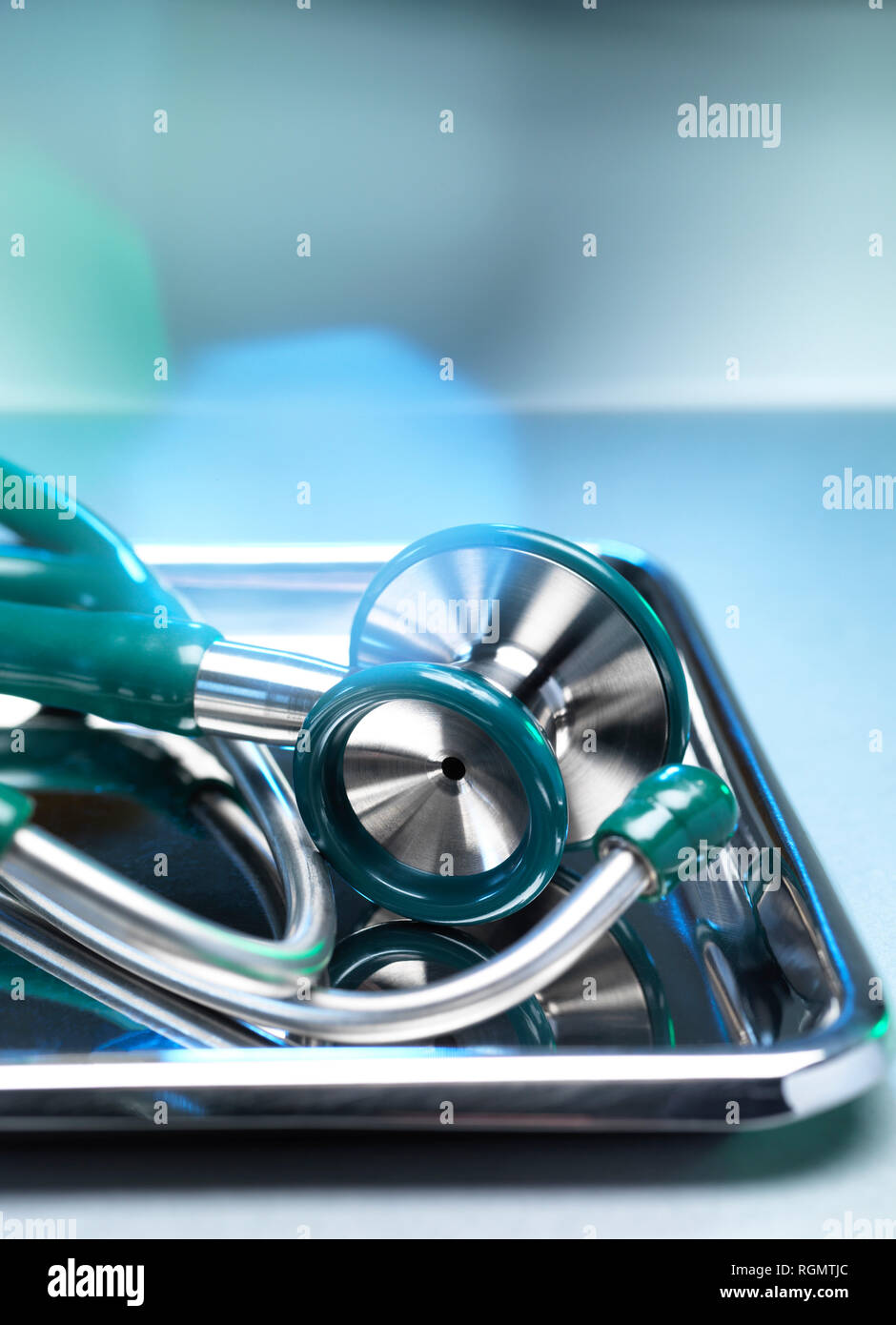 Surgical instruments, stethoscope in a bowl Stock Photo
