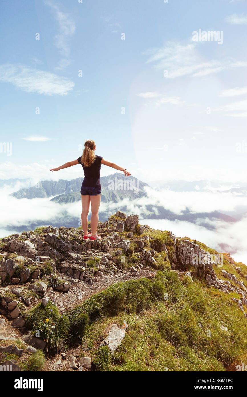 Austria, South Tyrol, female hiker, teenage girl arms outstretched Stock Photo