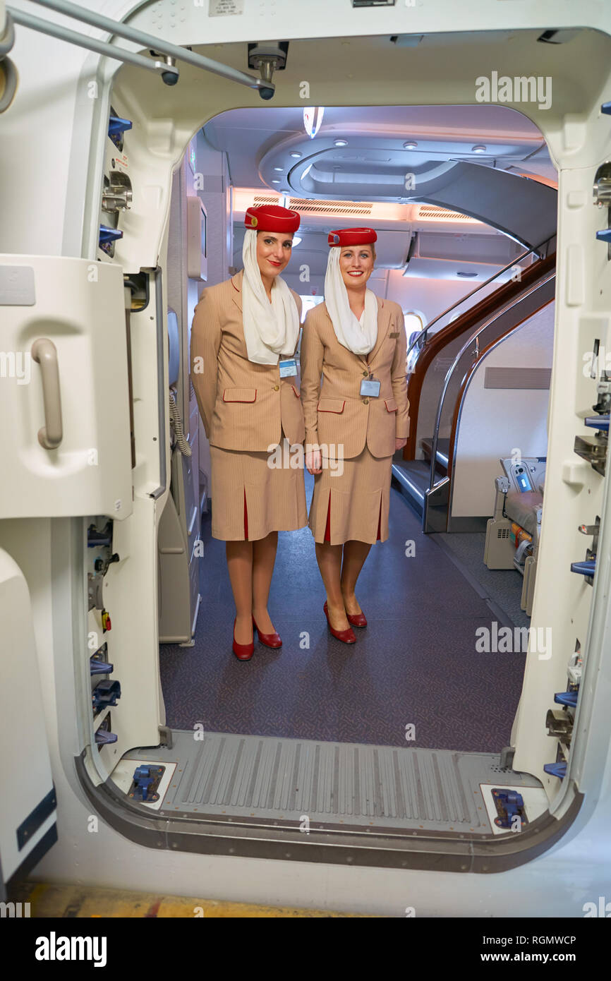 HONG KONG - CIRCA NOVEMBER, 2016: Emirates crew members on board of A380. Emirates is one of two flag carriers of the UAE along with Etihad Airways an Stock Photo