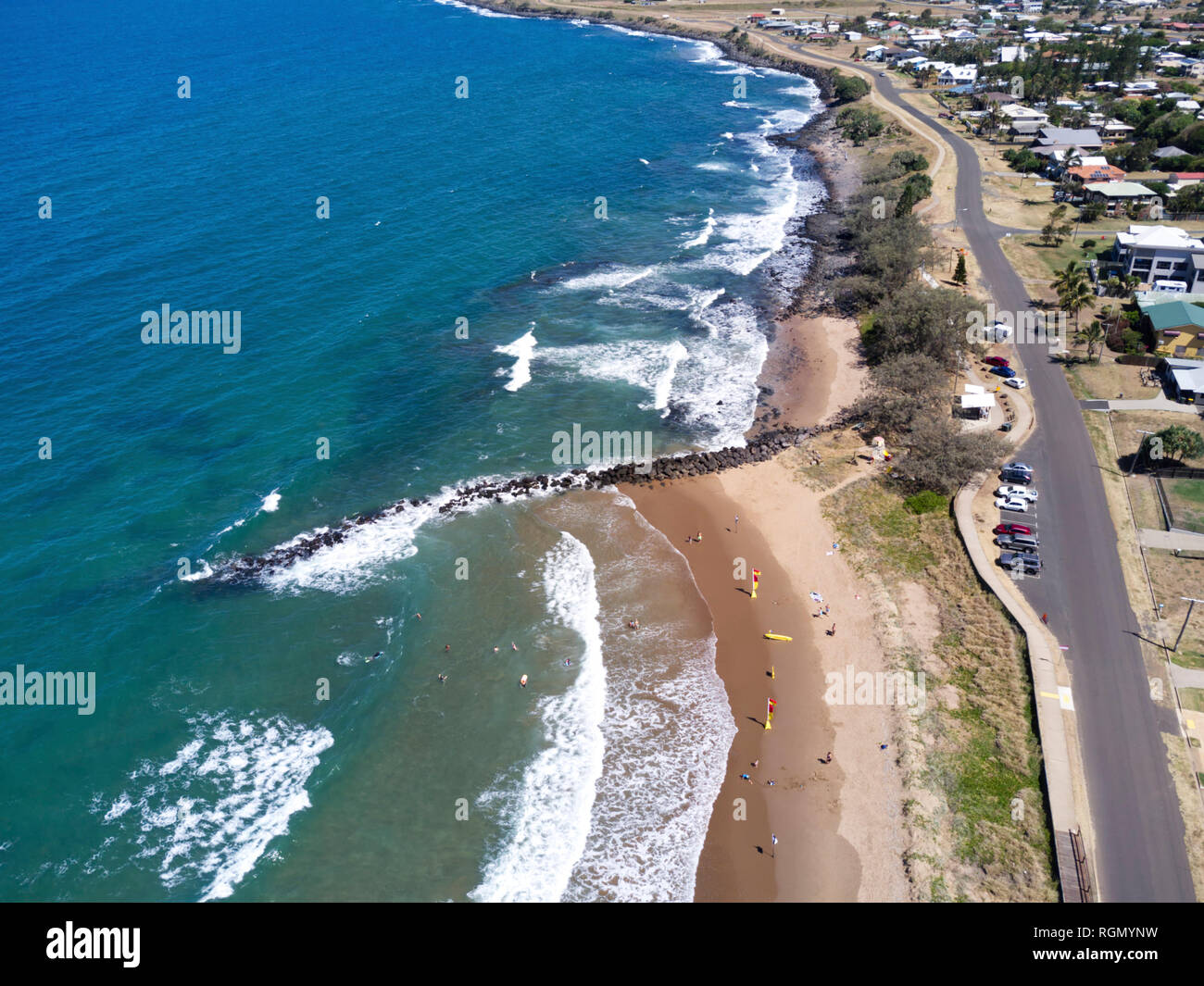 Aerial of a patrolled surf beach at Oaks Beach - Burnett Heads a coastal community near Bundaberg Queensland Australia Stock Photo