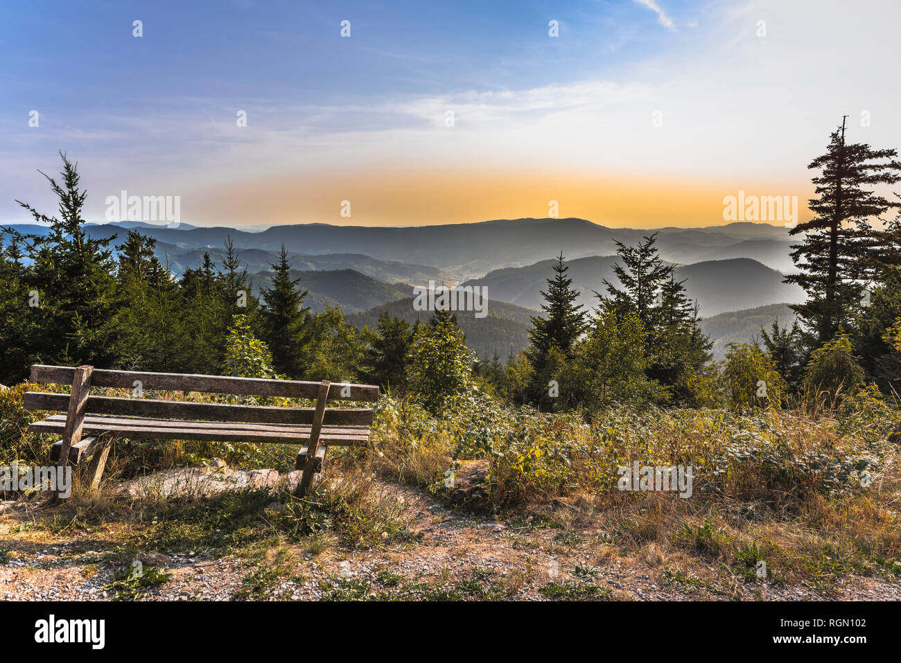 panorama with the mountain range of Northern Black Forest, Germany, viewpoint with bench at the Westweg hiking trail Stock Photo