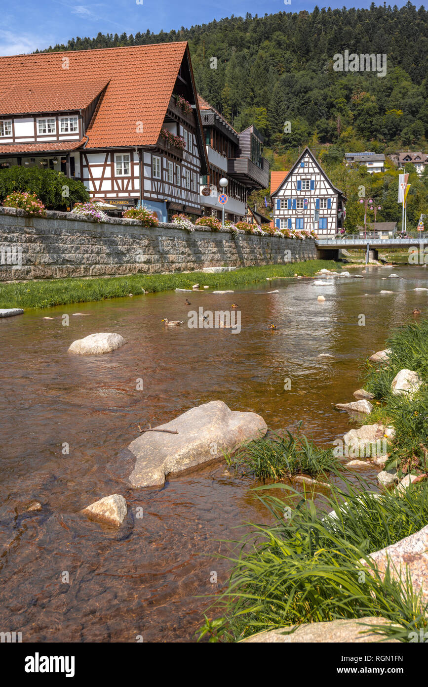river Schiltach through town Schiltach, Black Forest, Germany, bridge and hills, Kinzig valley Stock Photo