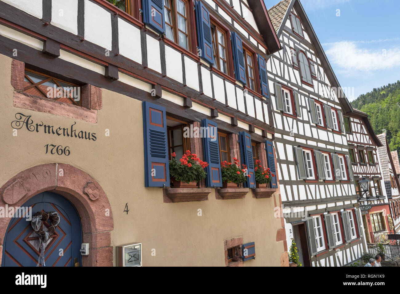 the old town Schiltach, Black Forest, Germany, row of old half-timbered houses in the inner-city with view to the Black Forest Stock Photo