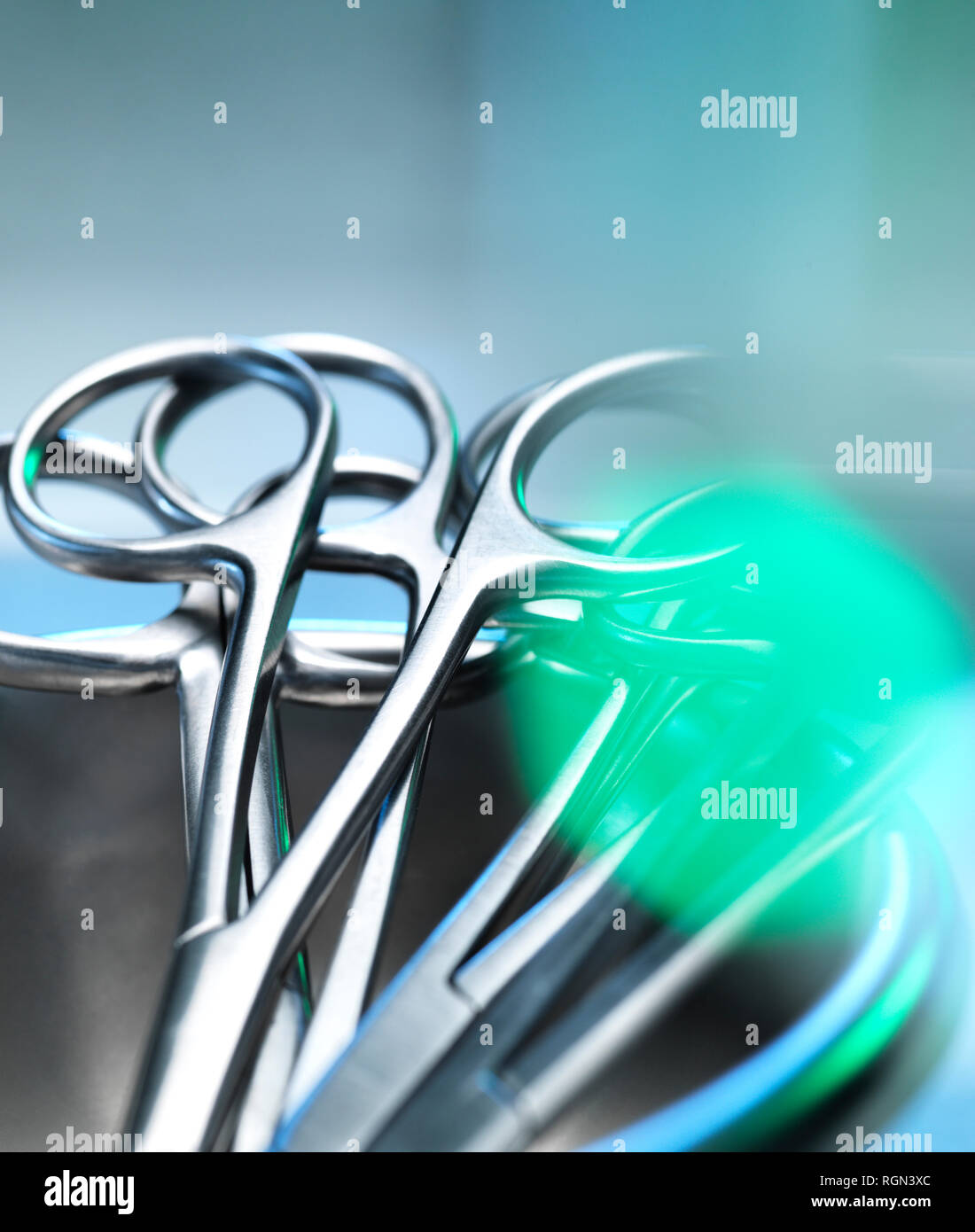 Surgical instruments, surgical scissors in a kidney shaped dish Stock Photo