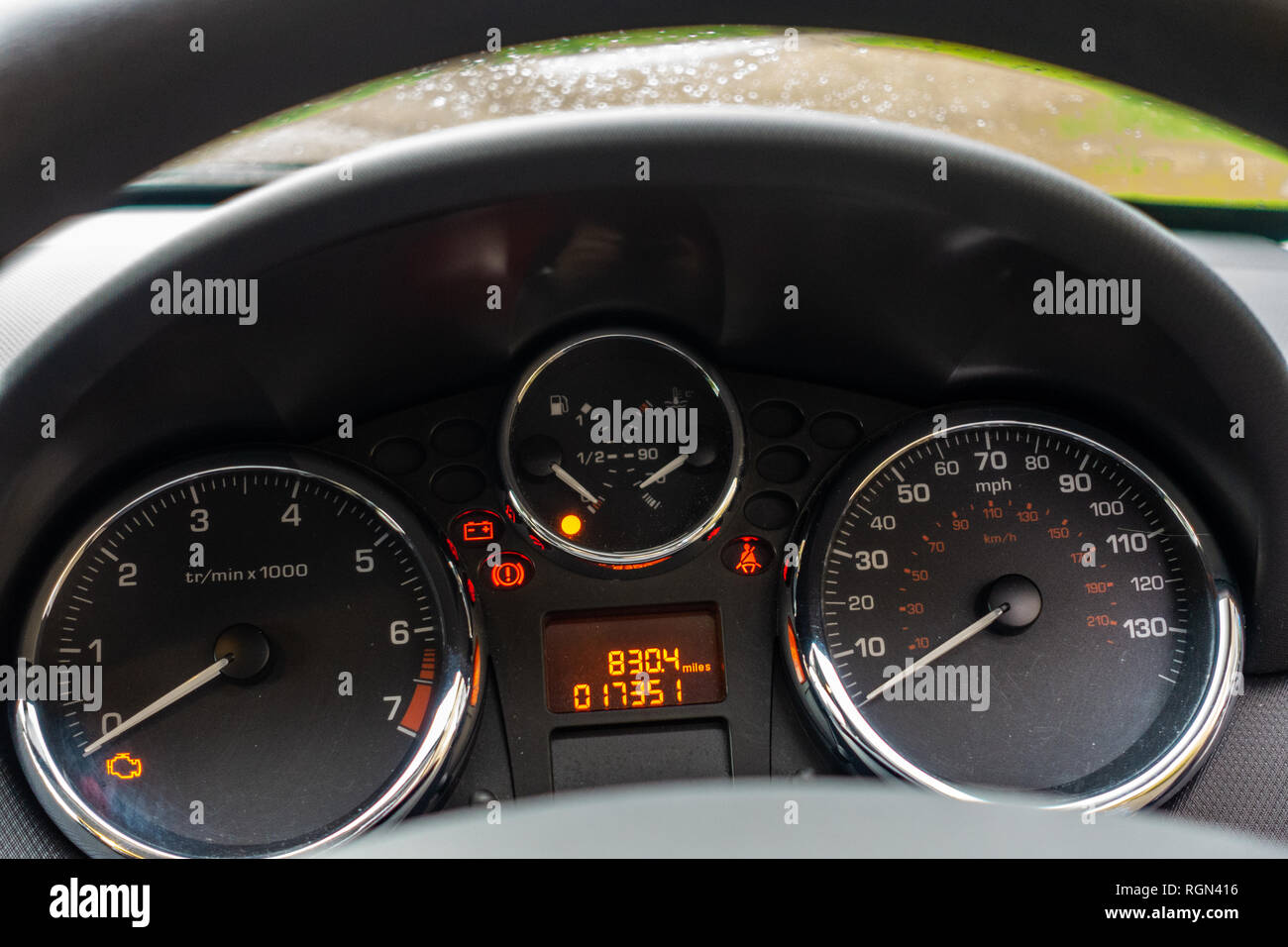 Dashboard and dials on a Peugeot 207 car Stock Photo - Alamy