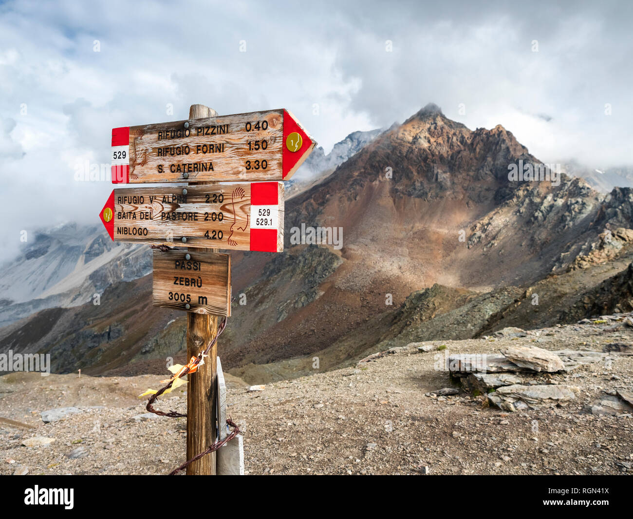 Italy, Ortler Alps, sign post, Gran Zebru in the background Stock Photo