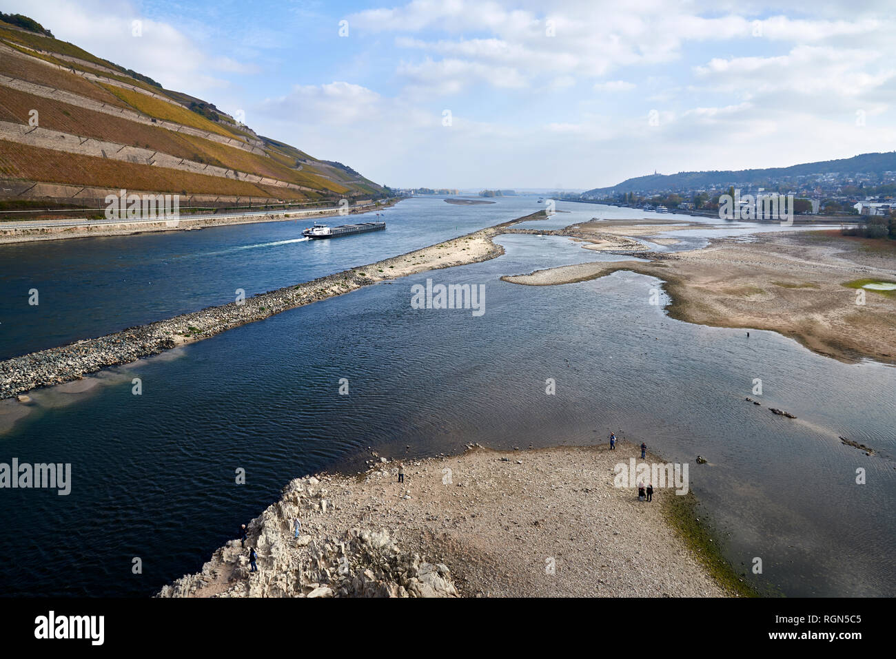 Germany, Rhineland-Palatinate, Bingen, Rhine river, low tide, cargo ship Stock Photo