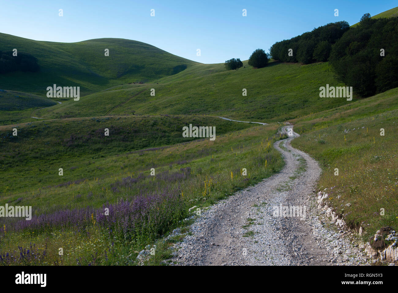 Italy, Umbria, Sibillini National Park, Dirt road in the SIbillini mountains Stock Photo