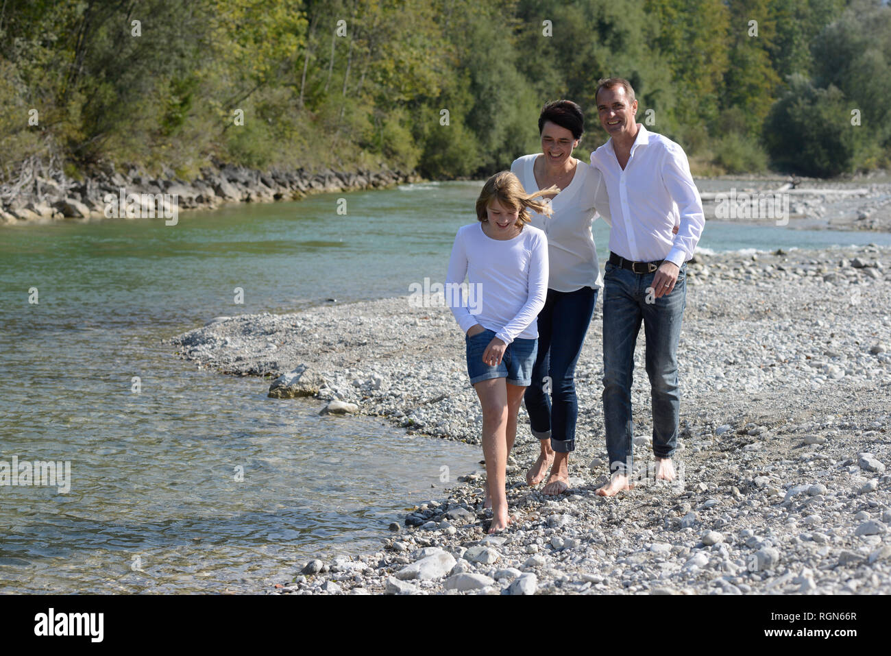 Family walking at the river Isar, Upper Bavaria, Germany Stock Photo
