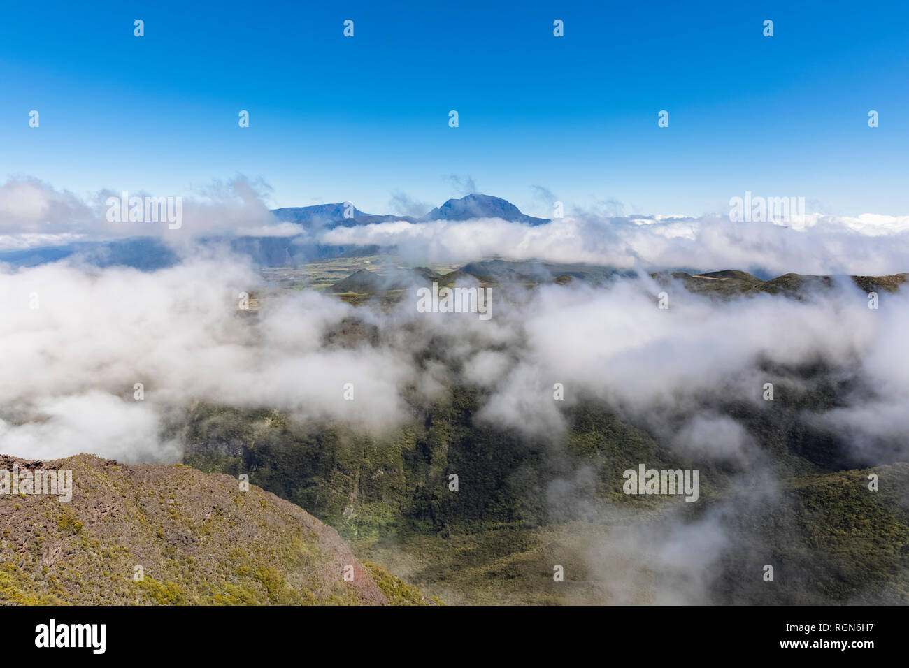 Reunion, Reunion National Park, Route forestiere du Volcan, View from Riviere des Remparts and Piton des Neiges Stock Photo