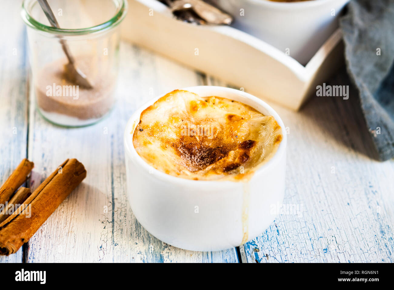 Bowl of Turkish oven baked rice pudding with cinnamon Stock Photo
