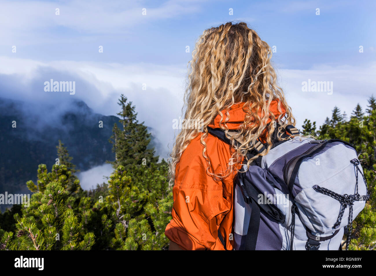 Young woman hiking in the Bavarian mountains Stock Photo