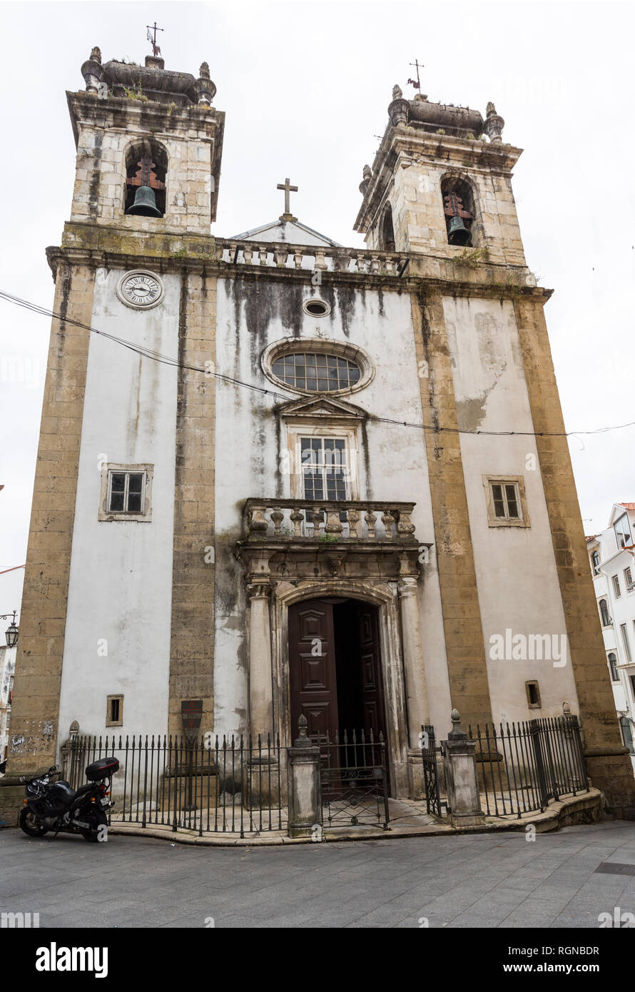 Facade of the actual Church of St Bartholomew, built in the 18th century in simple Baroque architecture with portal and two bell towers, in the histor Stock Photo