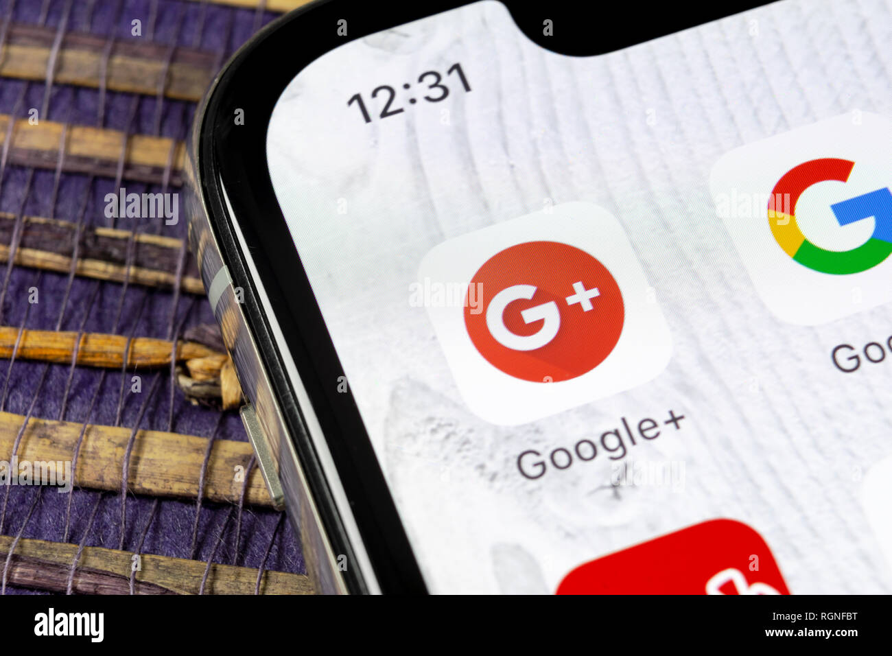 Sankt-Petersburg, Russia, December 5, 2018: Google plus application icon on Apple iPhone X smartphone screen close-up. Google plus app icon. Google+.  Stock Photo