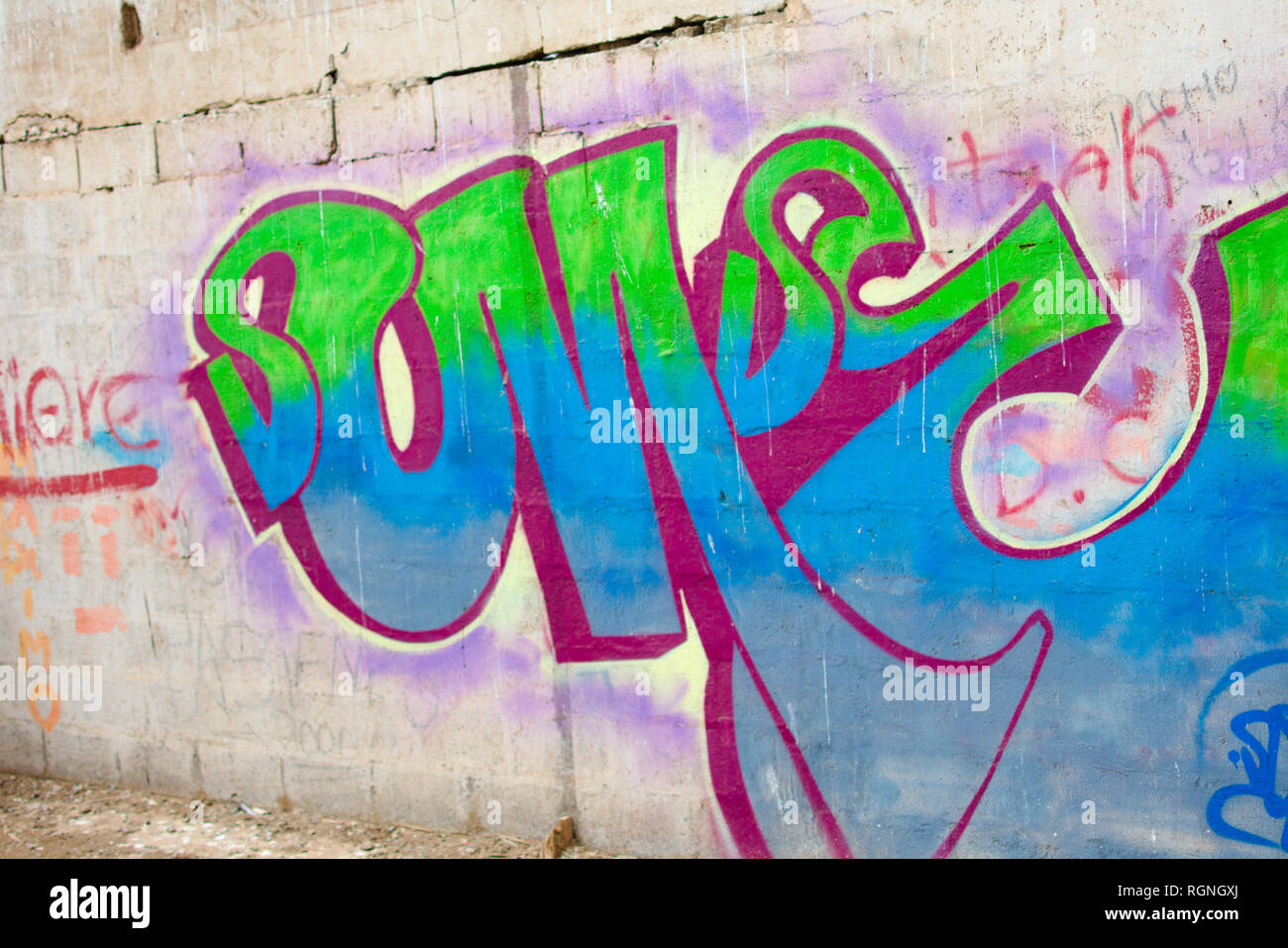 Urban Art, graffiti and colors in the walls of an old building Stock Photo