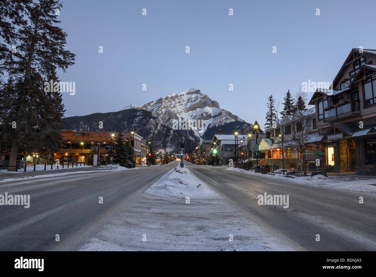 Early winter morning view down Banff Avenue with Cascade Mountain in the background. Stock Photo