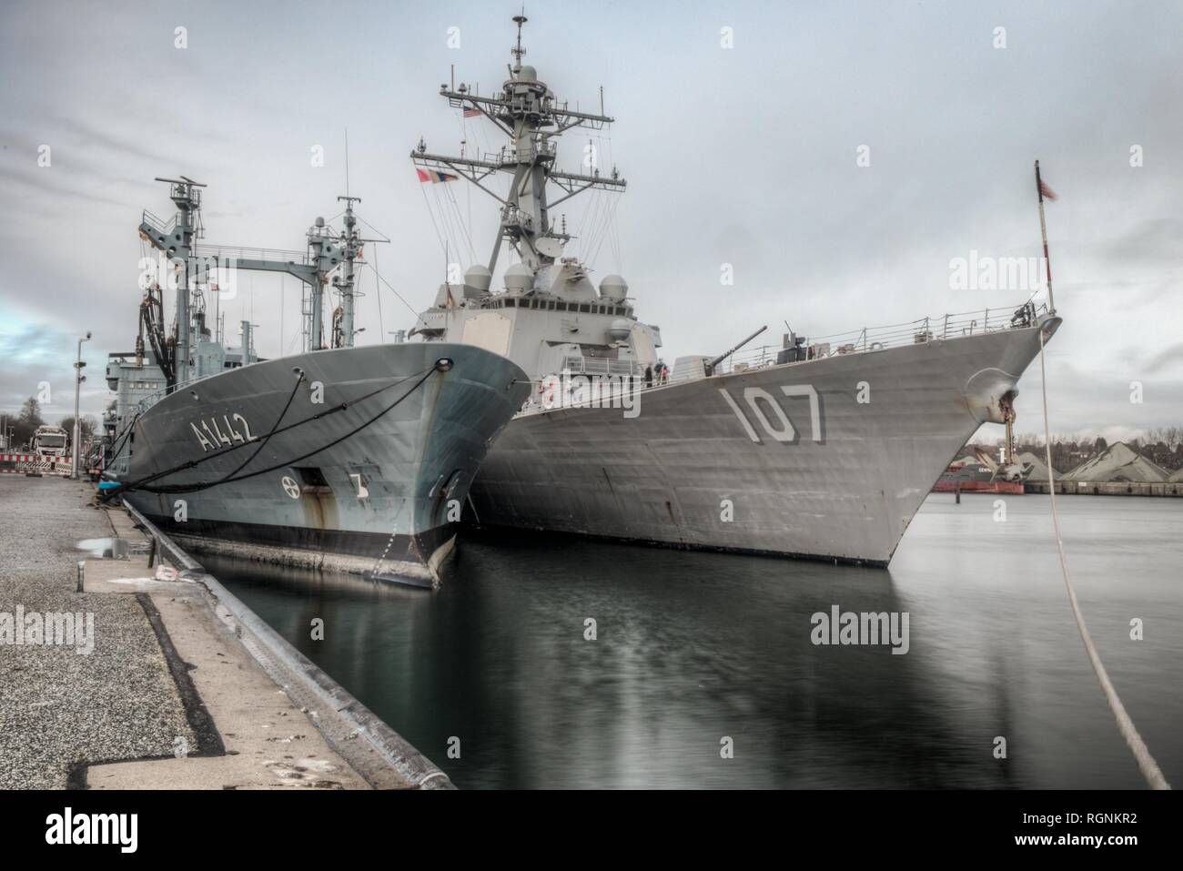 190126-N-EJ384-006 KIEL, Germany (Jan. 26, 2019) The guided-missile destroyer USS Gravely (DDG 107) is moored alongside the German navy Rhon-class tanker FGS Spessart (A1442) during a brief stop for fuel.  Gravely is underway to conduct maritime operations as the flagship of Standing NATO Maritime Group 1 providing a continuous maritime capability for NATO in the northern Atlantic. (U.S. Navy photo by Lt. Lyndsi Gutierrez/Released) Stock Photo