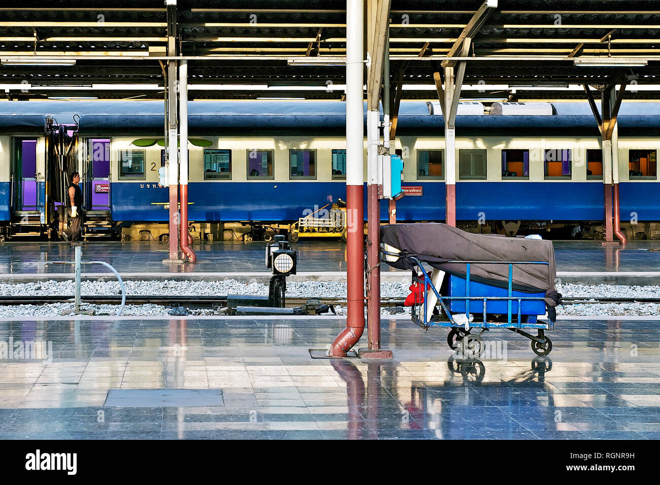 Hualamphong Central Train Station in Bangkok, Thailand - June 15 2011: Coaches at a very empty and very clean looking platform Stock Photo