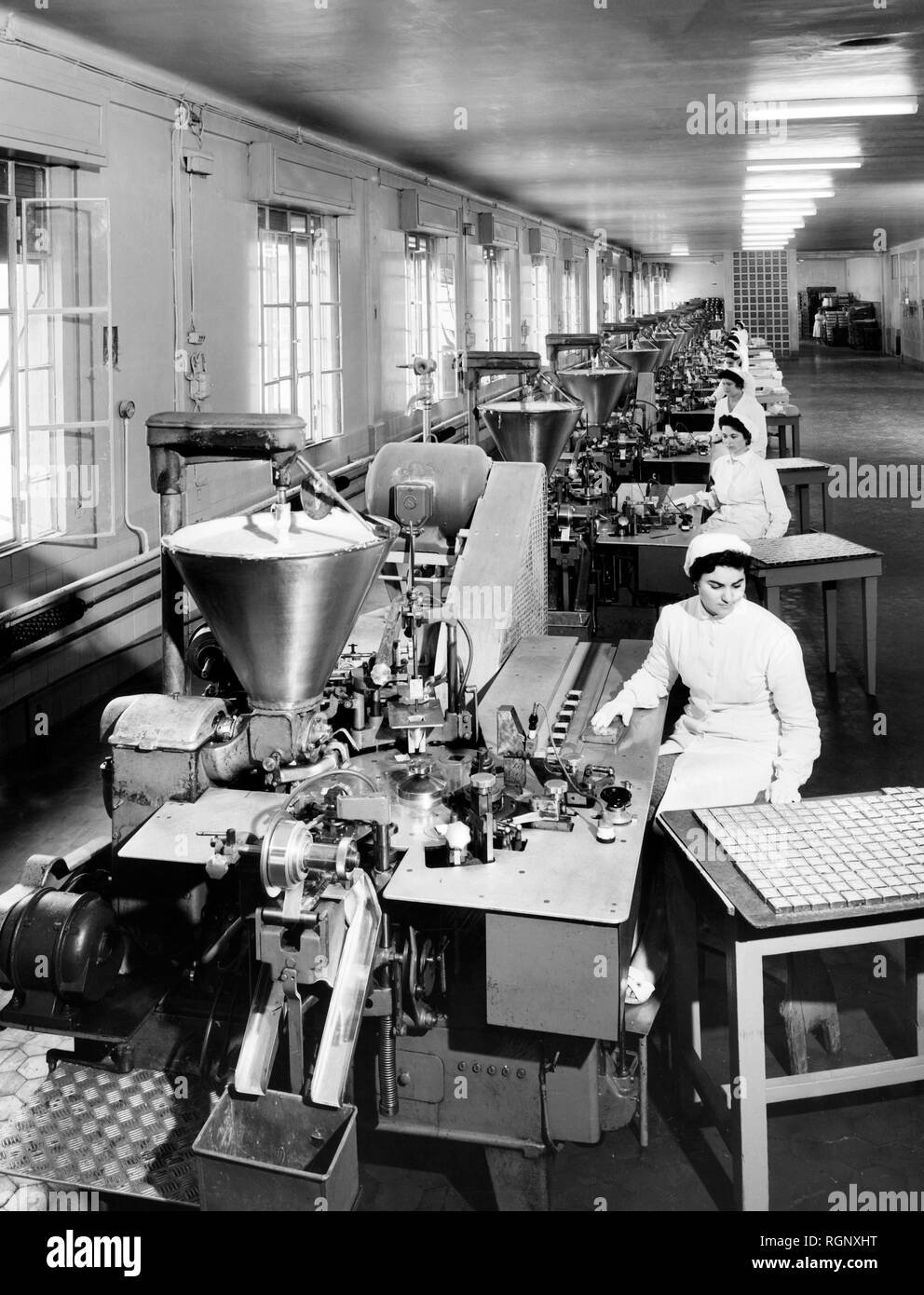 line production of pasteurized cheese, italy 1965 Stock Photo Alamy