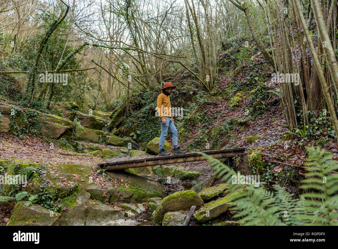 Man walking on bridge side view hi-res stock photography and images - Alamy