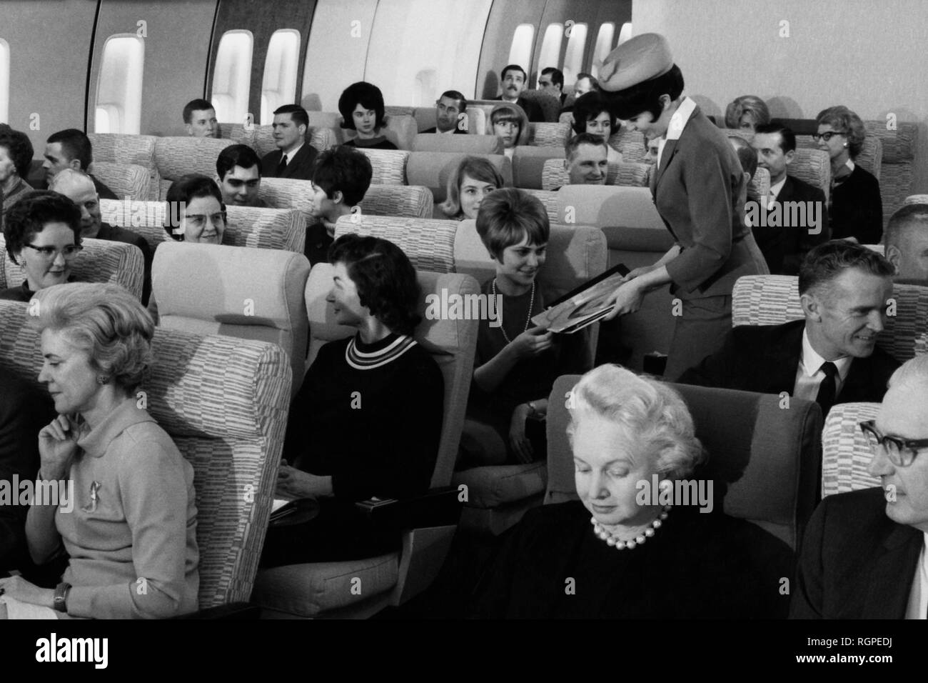 passengers on a jumbo jet, 1960 Stock Photo