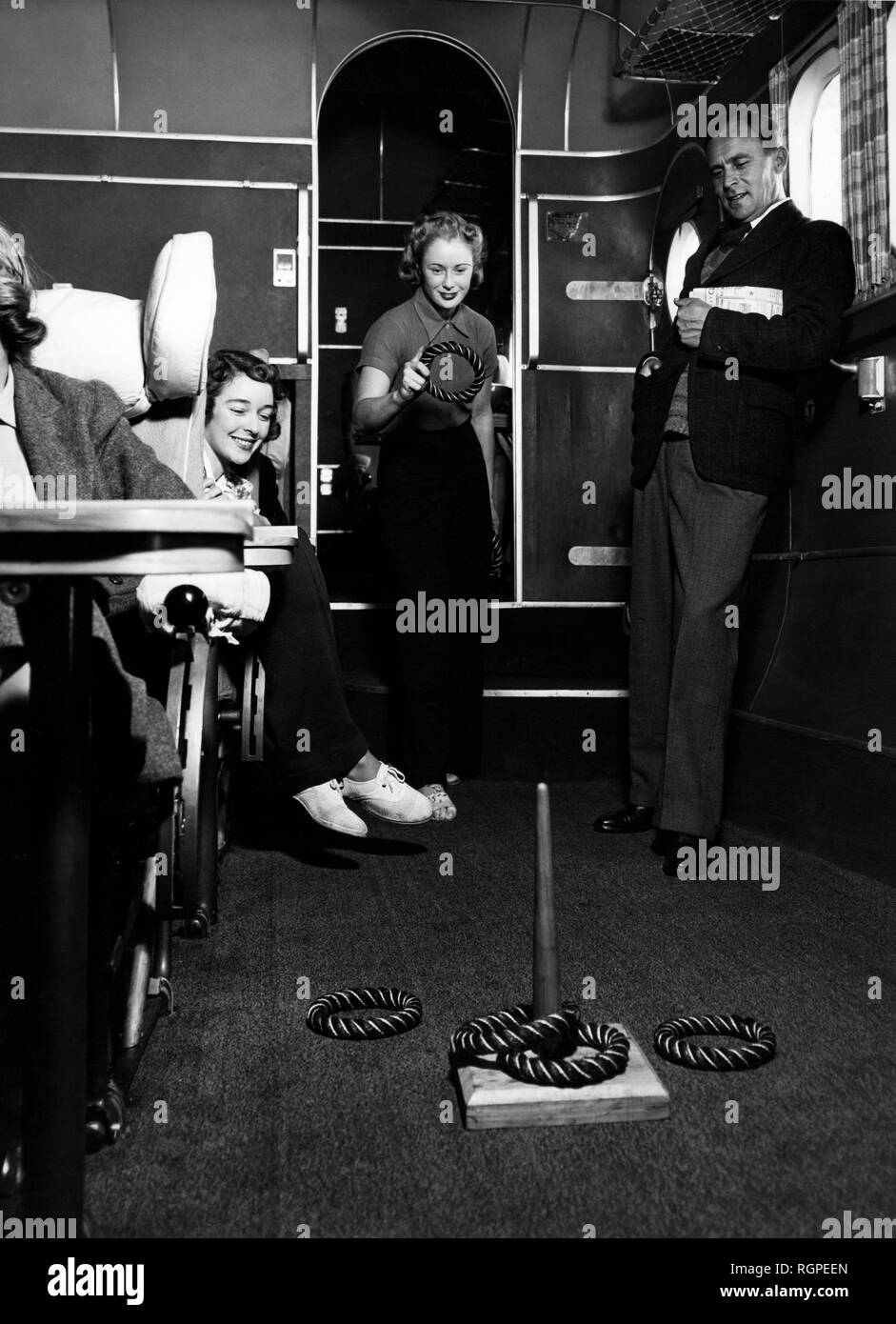 passengers playing on the empire, 1940-50 Stock Photo