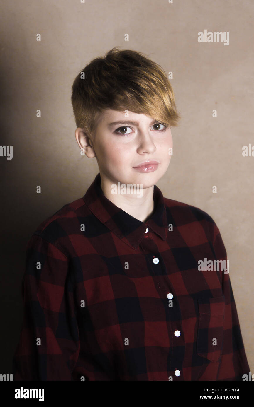 Teenager Girl With Short Haircut Concrete Wall On Background Stock