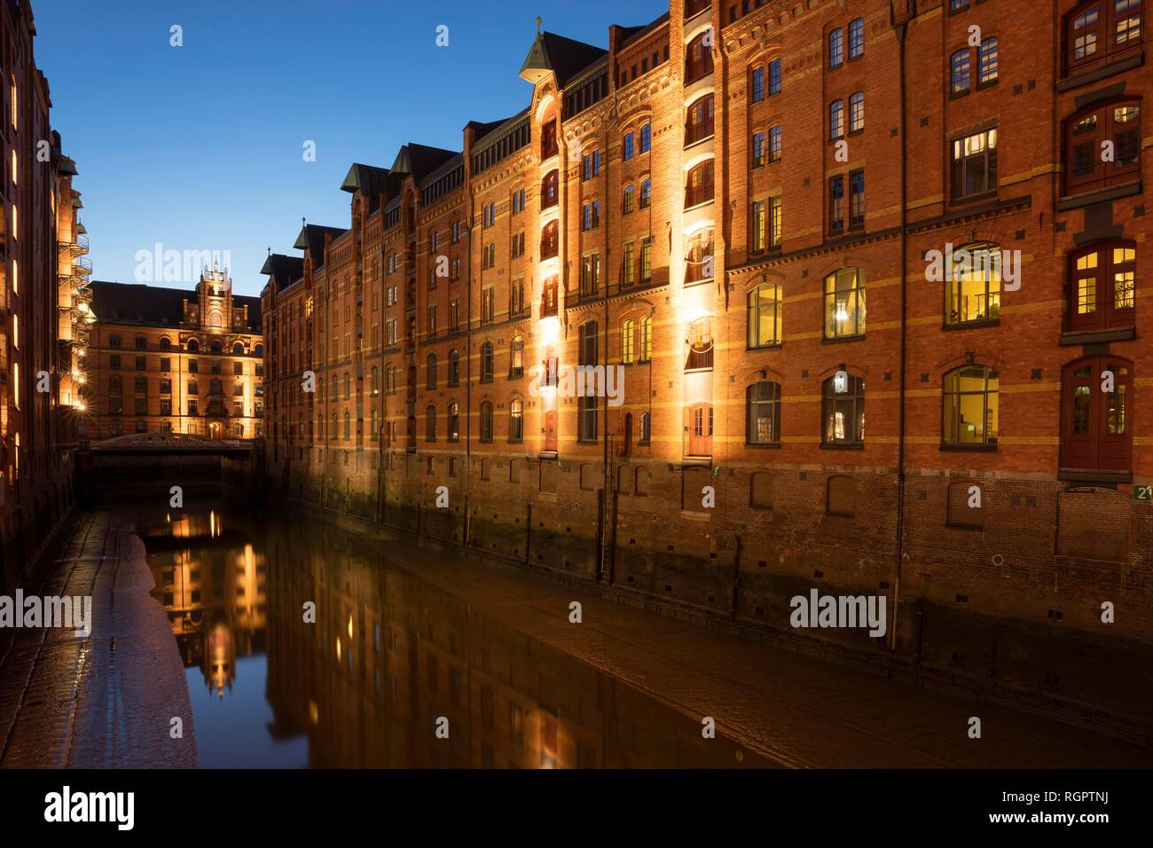 Warehouse building at the blue hour, Speicherstadt, Hamburg, Germany Stock Photo