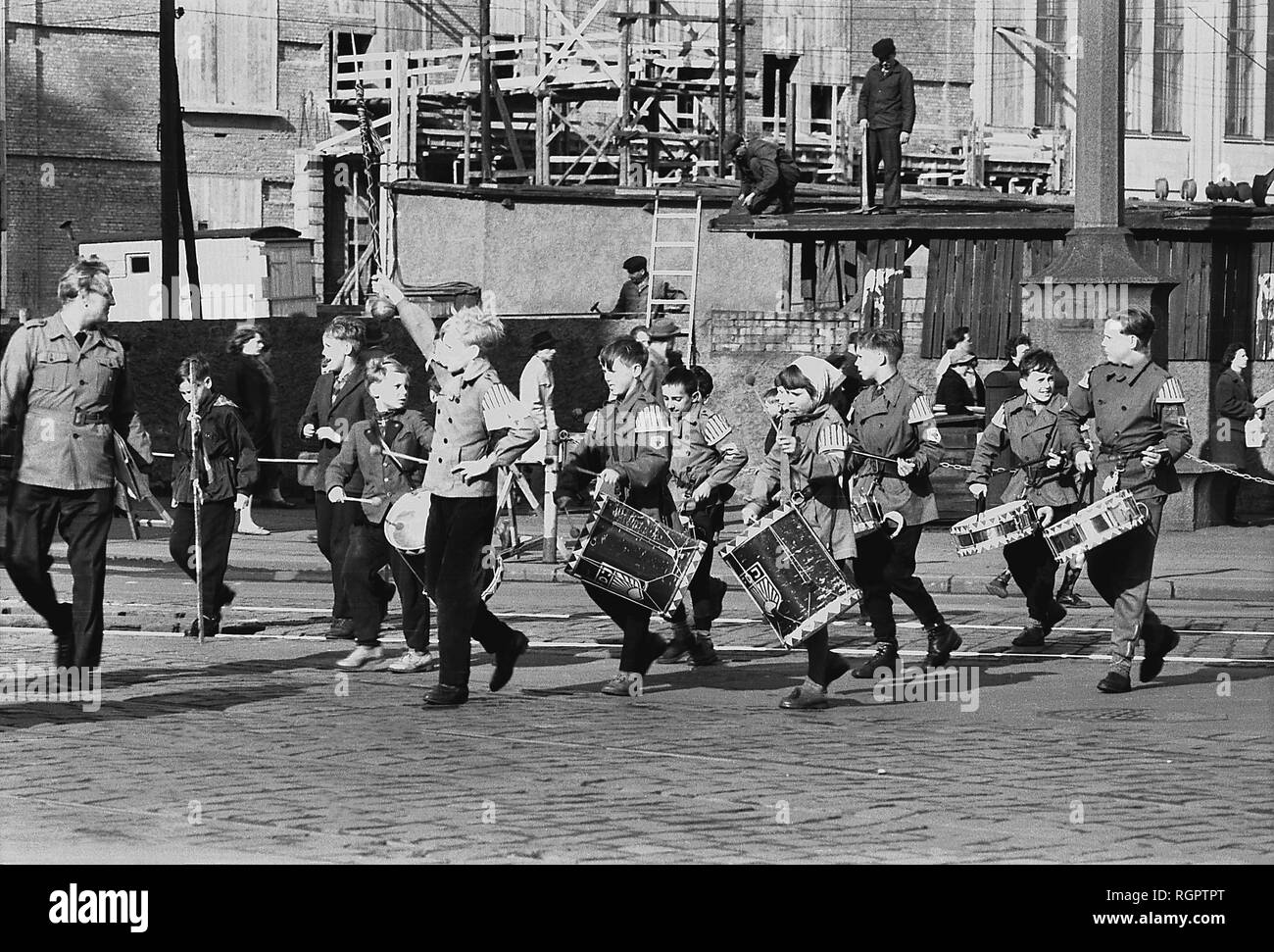 Children playing music, music procession, 1960, KarlMarxPlatz today