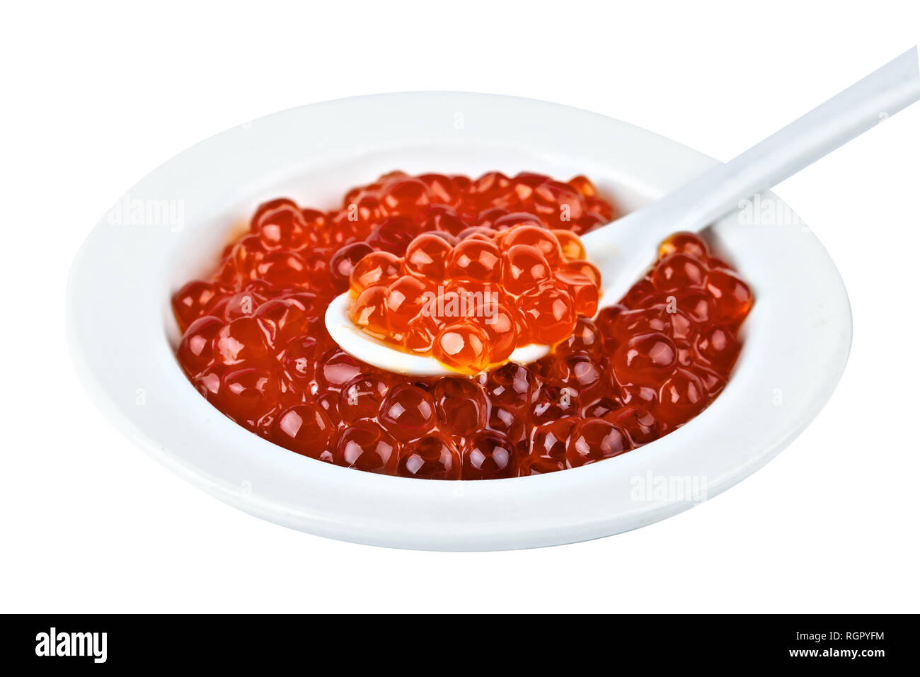 Red caviar in a glass container. Isolated object on white background. Stock Photo