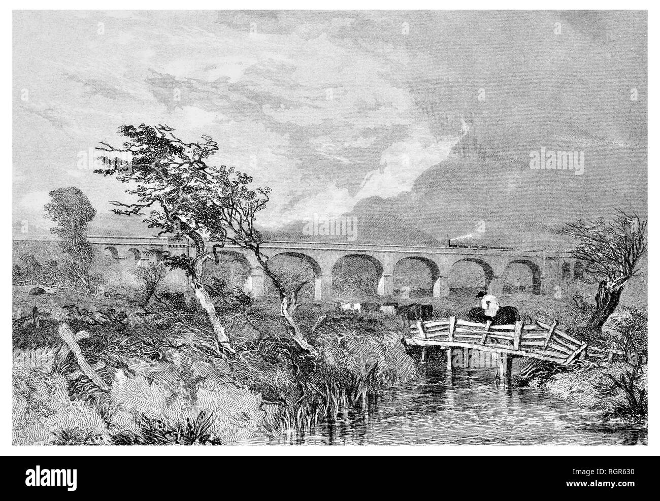 Steam train over the Wolverton viaduct near Stony Stratford Stock Photo