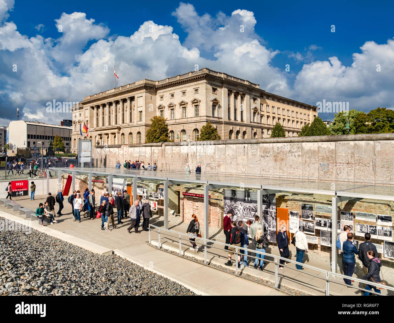 22 September 2018: Berlin, Germany - Tourists sightseeing at a preserved section of the Berlin Wall at Topography of Terror, on  Niederkirchnerstrasse Stock Photo