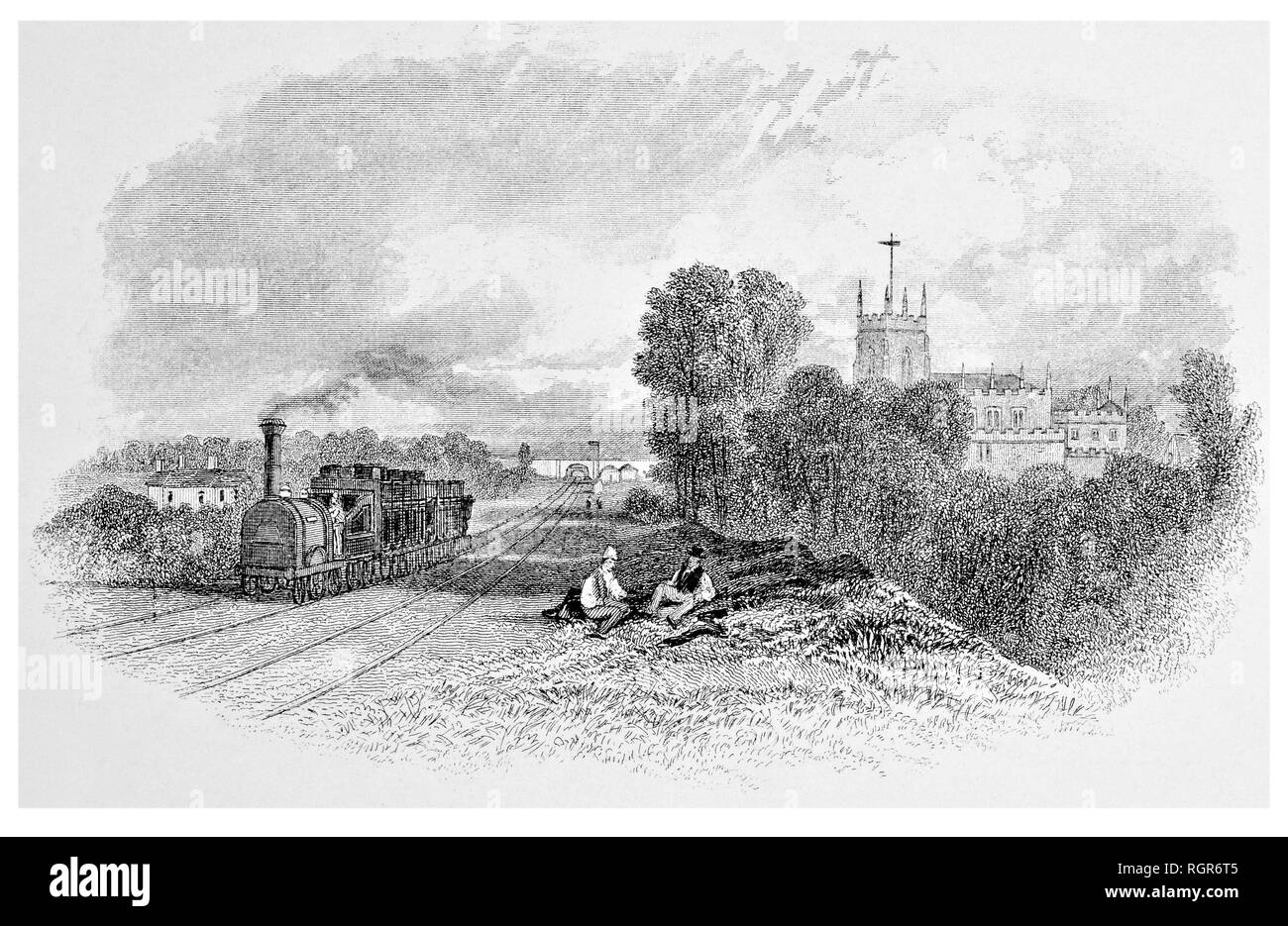 Steam train and church at Penkridge Stock Photo