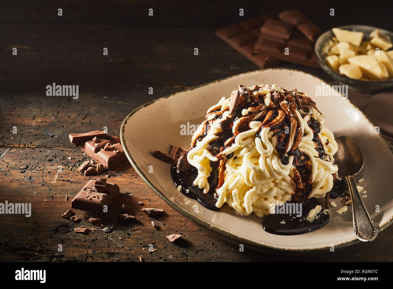 Spaghetti ice cream dessert with chocolate sweet sauce Stock Photo Alamy