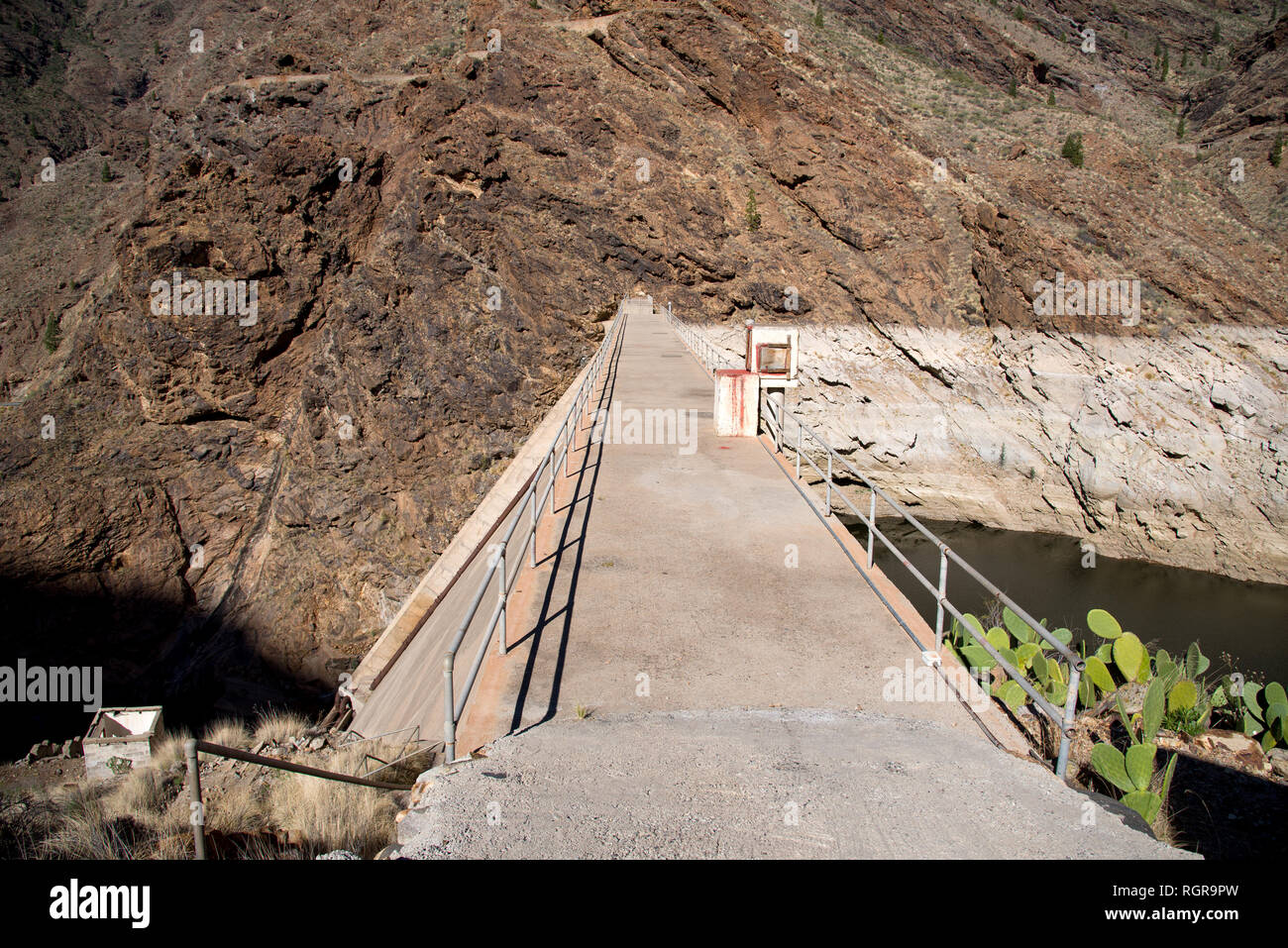 Top of Dam - Presa Del Parralillo in mountains, altitude 53 m in  Gran Canaria, Spain, Stock Photo