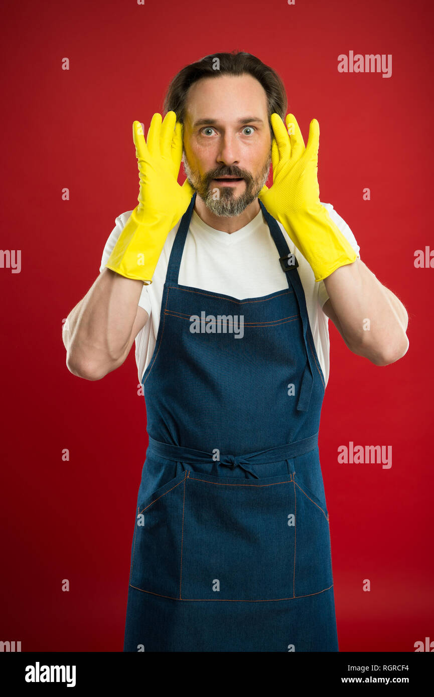 Man In Apron With Gloves Cleaning Agent Cleaning Day Today Bearded Guy Cleaning Home On Guard 