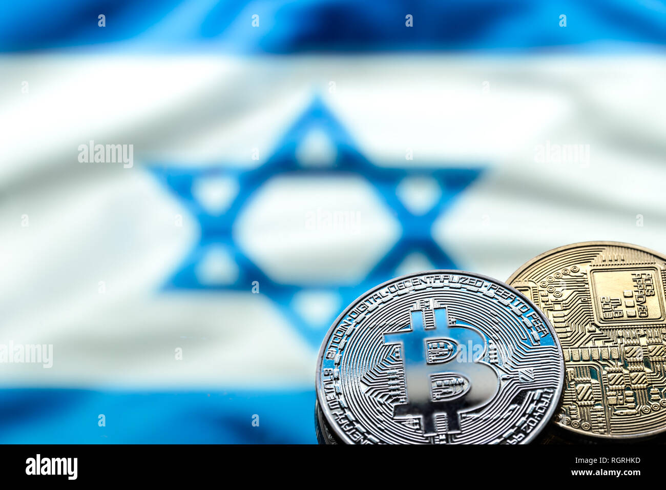 Bitcoin coins on the background of the Israeli flag, the concept of virtual  money, close-up. Conceptual image of digital crypto currency Stock Photo -  Alamy