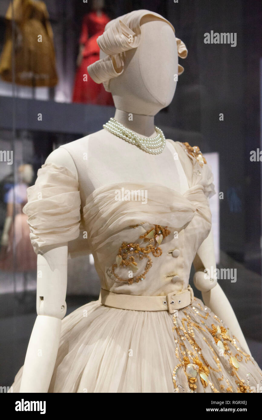 An embroidered dress made for and worn by Princess Margaret on her 21st birthday on show in the 'Christian Dior: Designer of Dreams' exhibition at the Stock Photo