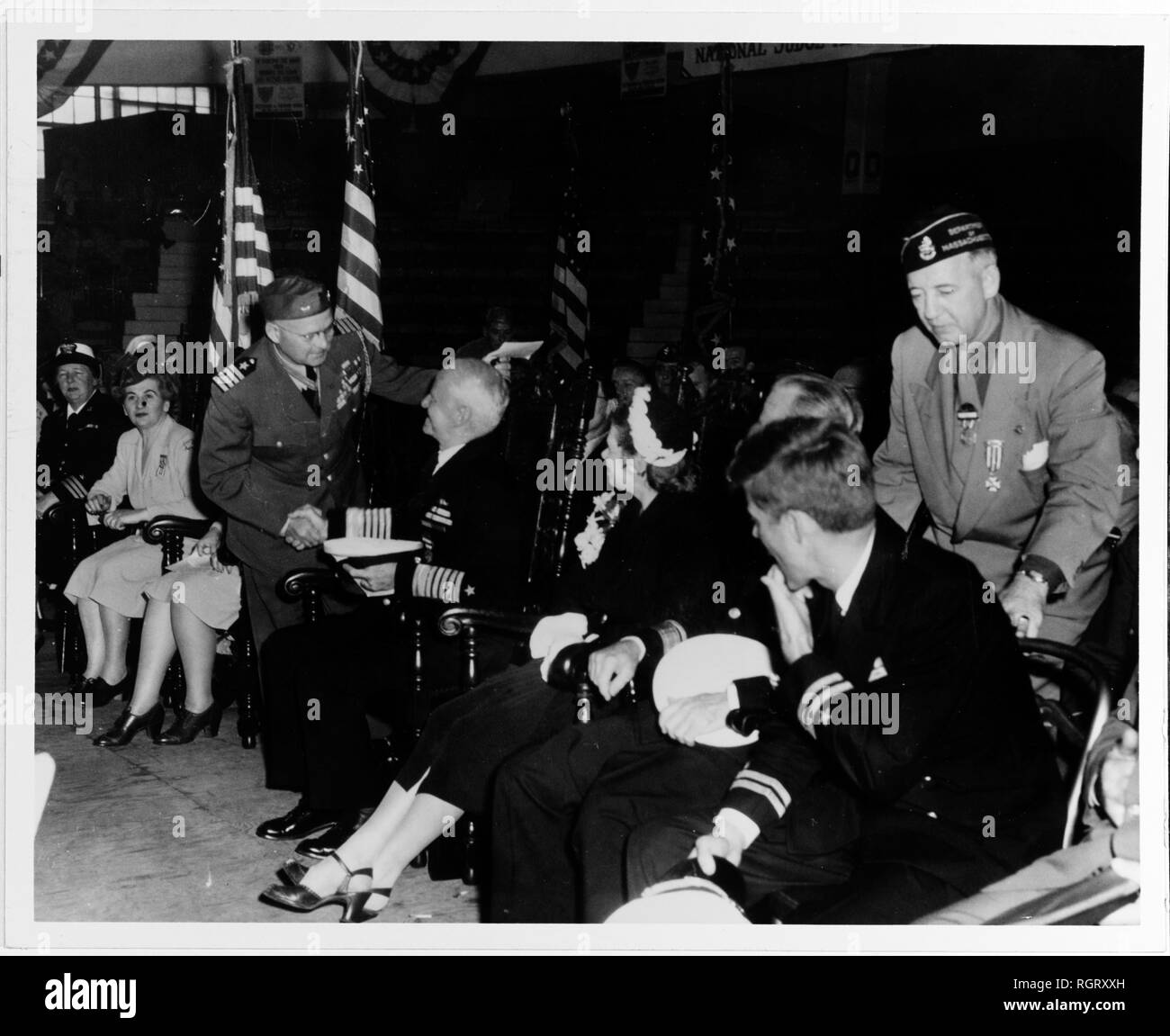 Attend a VFW Rally in New York City, after the end of World War II. At right is Lieutenant John F. Kennedy..jpg - RGRXXH Stock Photo