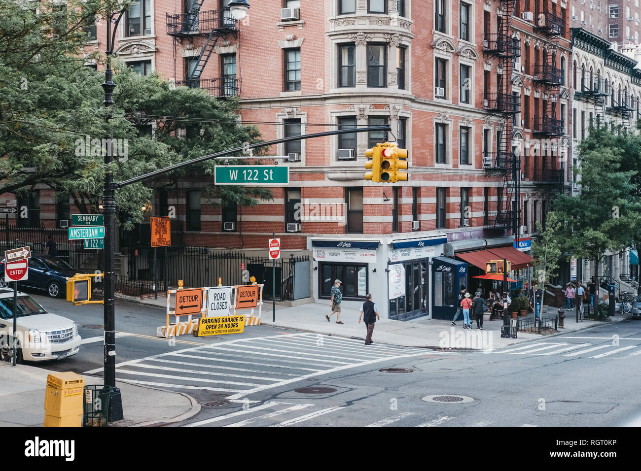New York, USA June 01, 2018 People walking on a street in Harlem