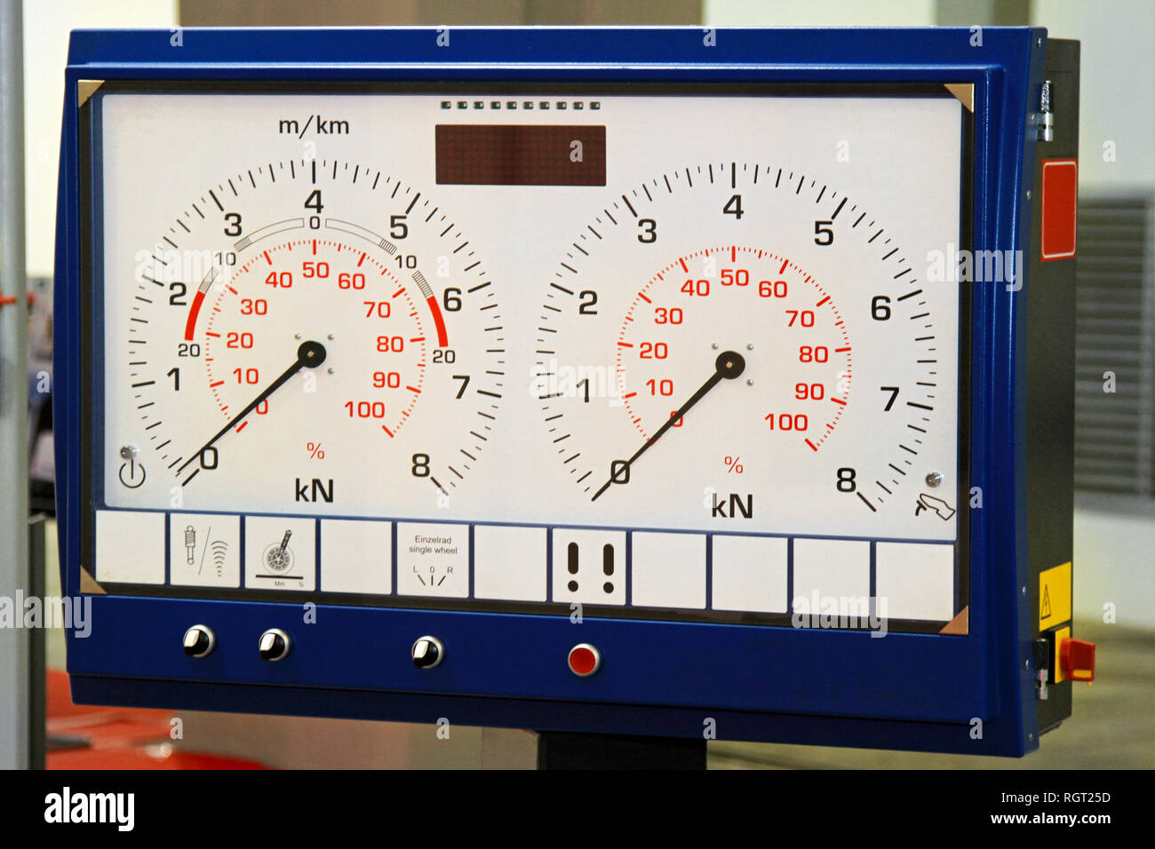 Brake test equipment with gauges in garage Stock Photo Alamy