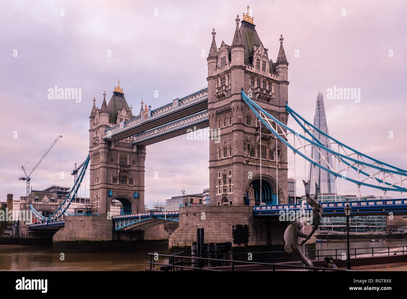 London, UK, December 07, 2013: Tower Bridge and the Shard in morning light, cloudscape Stock Photo