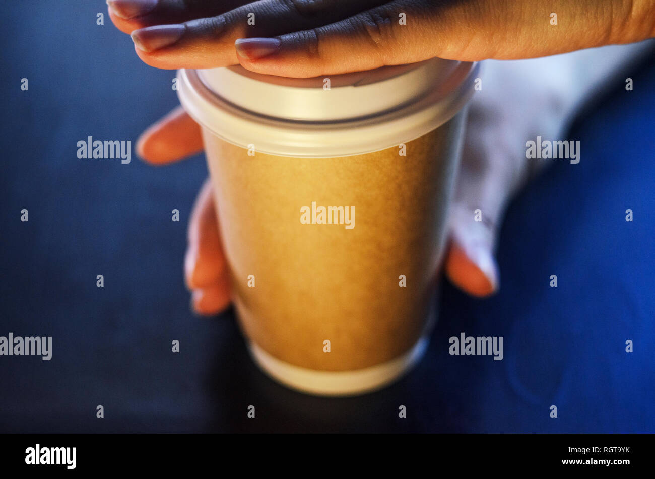 Barista serves a cup of coffee. Paper cup Plastic cap Coffee Barista ...
