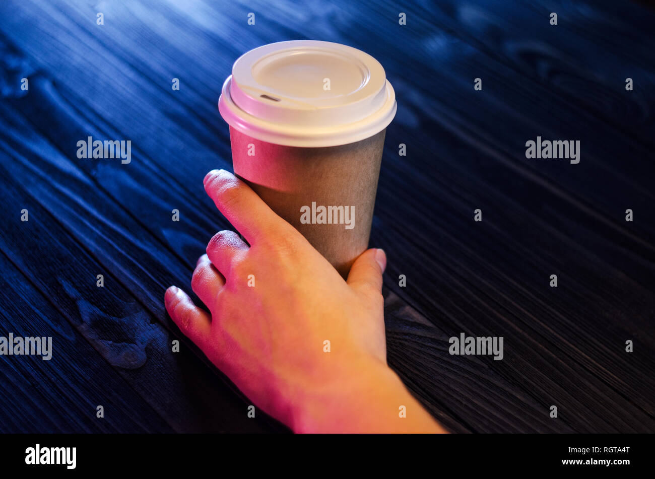 Barista serves a cup of coffee. Paper cup Plastic cap Coffee Barista ...